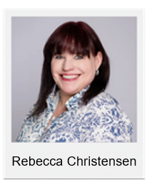 Portrait of Rebecca Christensen smiling, with dark brown hair and a blue patterned blouse.