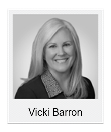 Headshot of Vicki Barron, a smiling blonde woman in a blazer looking at the camera.
